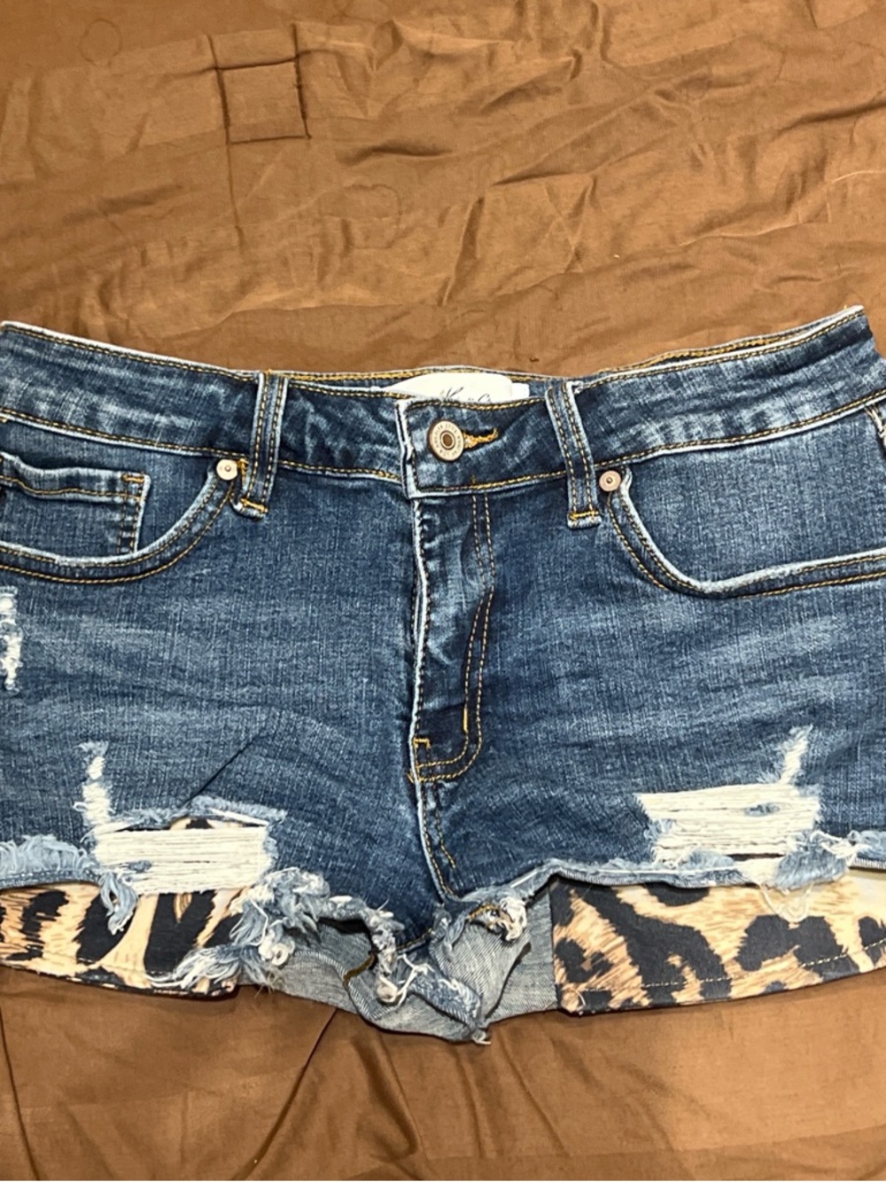 KanCan Blue Distressed Denim Shorts with Leopard Trim